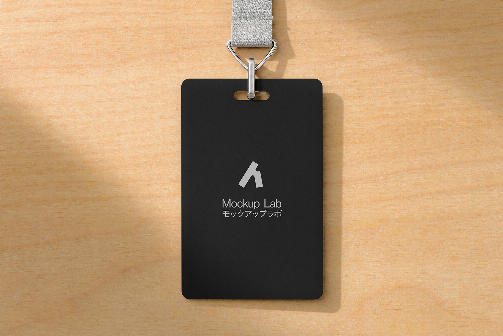 Close-up view of a round badge mockup with a customizable design on a plain background.